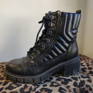 combat-style boots from the brand G Los Angeles.